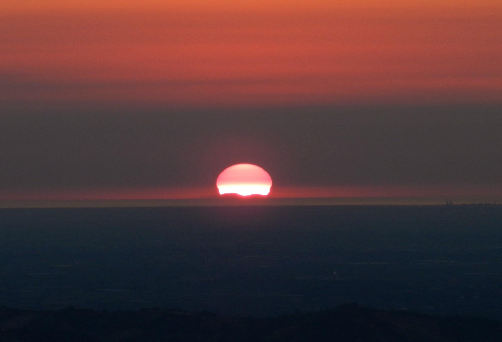 Sunrise over Monte Vojak in Istria, suggesting both cessation and dawn
